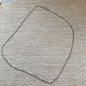 Silver chain necklace.